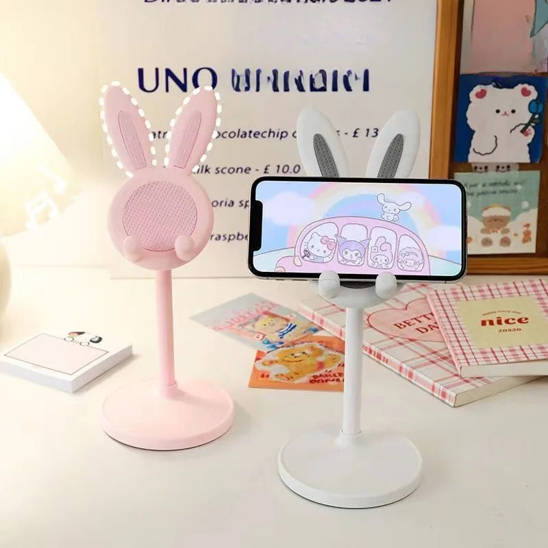 El bonito soporte para teléfono móvil de conejo, puede levantar y ajustar los accesorios de teléfono de escritorio, soporte para teléfono, empuñadura para teléfono