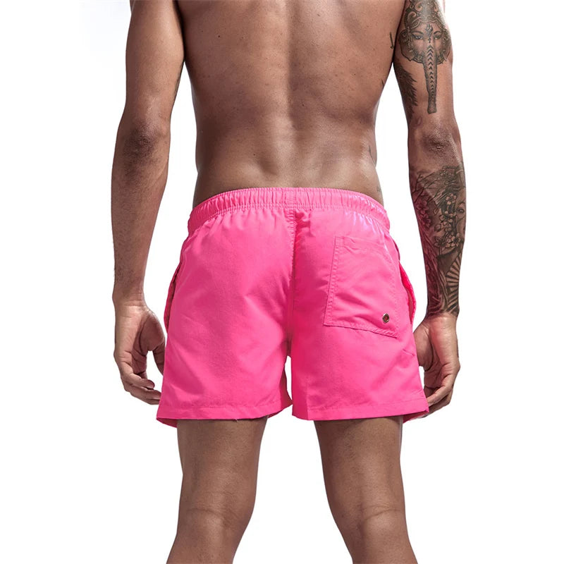 Maillot de bain pour hommes avec doublure en maille poches latérales short de plage solide séchage rapide léger cordon de serrage short de bain maillot de bain d'été