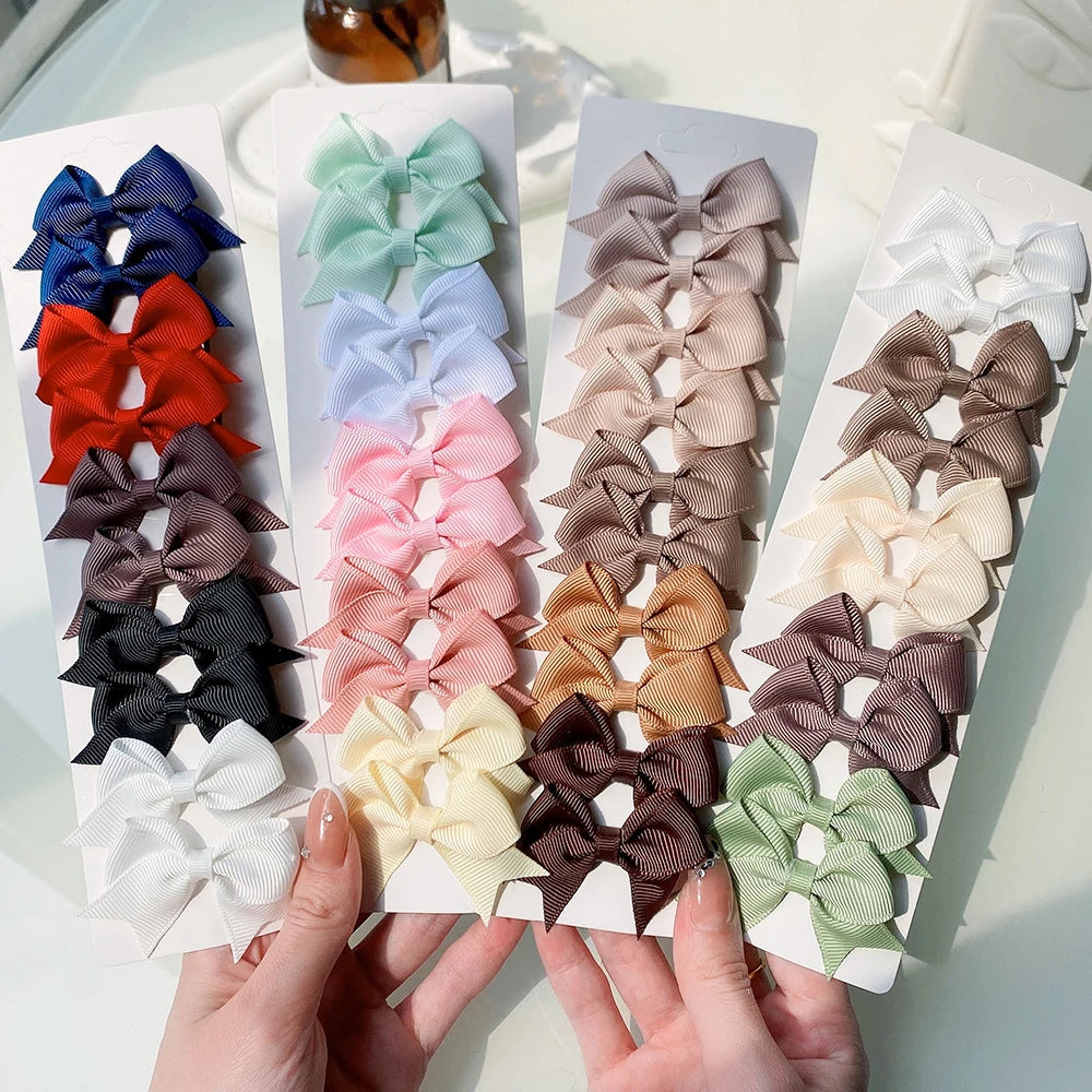 Pinces à cheveux avec nœuds pour enfants, couleur unie, pour bébés filles, ruban fait à la main, épingle à cheveux, Barrettes, accessoires pour cheveux du nouvel an, 10 pièces/ensemble