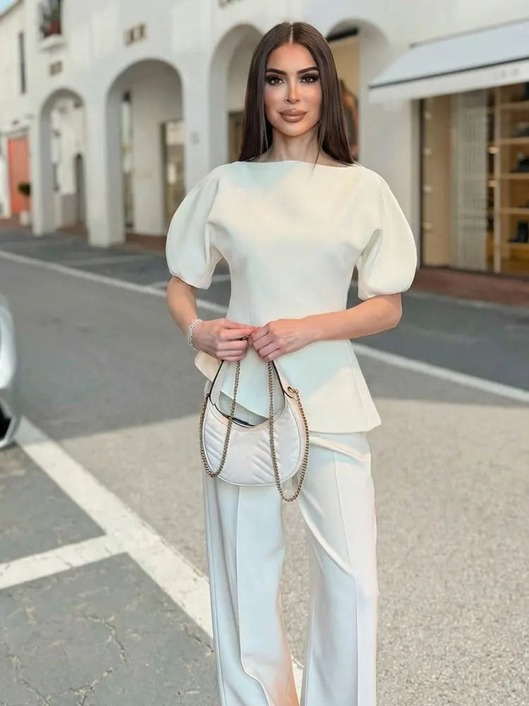 Blouse élégante à manches bouffantes et ourlet asymétrique pour femme — streetwear Y2K, printemps 2026