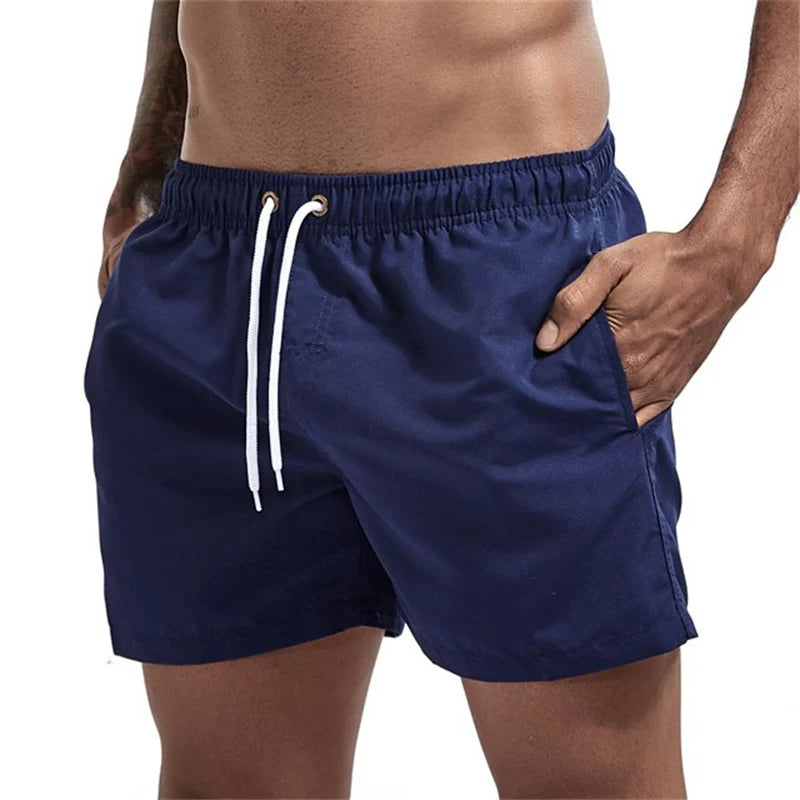 Maillot de bain pour hommes avec doublure en maille poches latérales short de plage solide séchage rapide léger cordon de serrage short de bain maillot de bain d'été