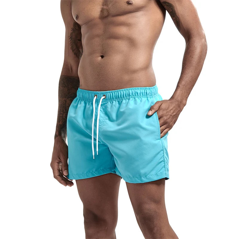 Maillot de bain pour hommes avec doublure en maille poches latérales short de plage solide séchage rapide léger cordon de serrage short de bain maillot de bain d'été