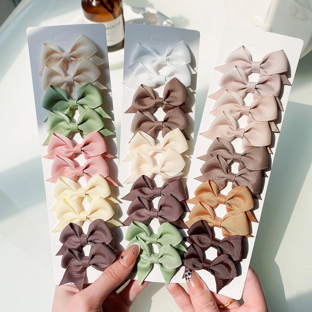 Pinces à cheveux avec nœuds pour enfants, couleur unie, pour bébés filles, ruban fait à la main, épingle à cheveux, Barrettes, accessoires pour cheveux du nouvel an, 10 pièces/ensemble