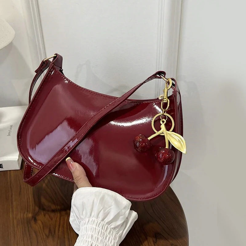 Bolso de cuero PU para mujer, versátil, a la moda, color sólido, colgante de cereza, bolso de hombro informal, bolso de mano, bolso de axila para niñas