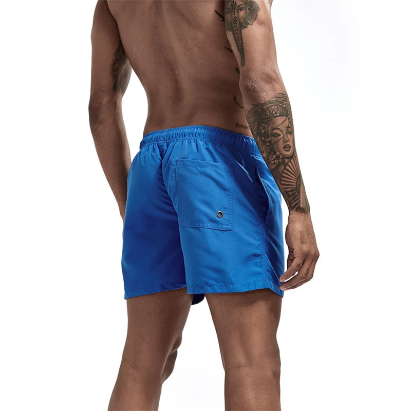 Maillot de bain pour hommes avec doublure en maille poches latérales short de plage solide séchage rapide léger cordon de serrage short de bain maillot de bain d'été