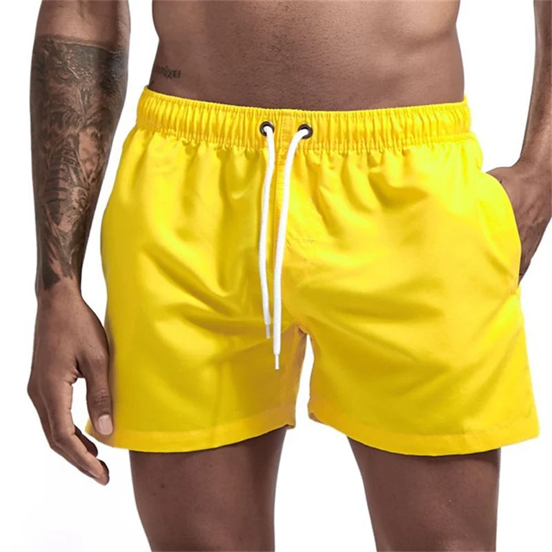 Maillot de bain pour hommes avec doublure en maille poches latérales short de plage solide séchage rapide léger cordon de serrage short de bain maillot de bain d'été