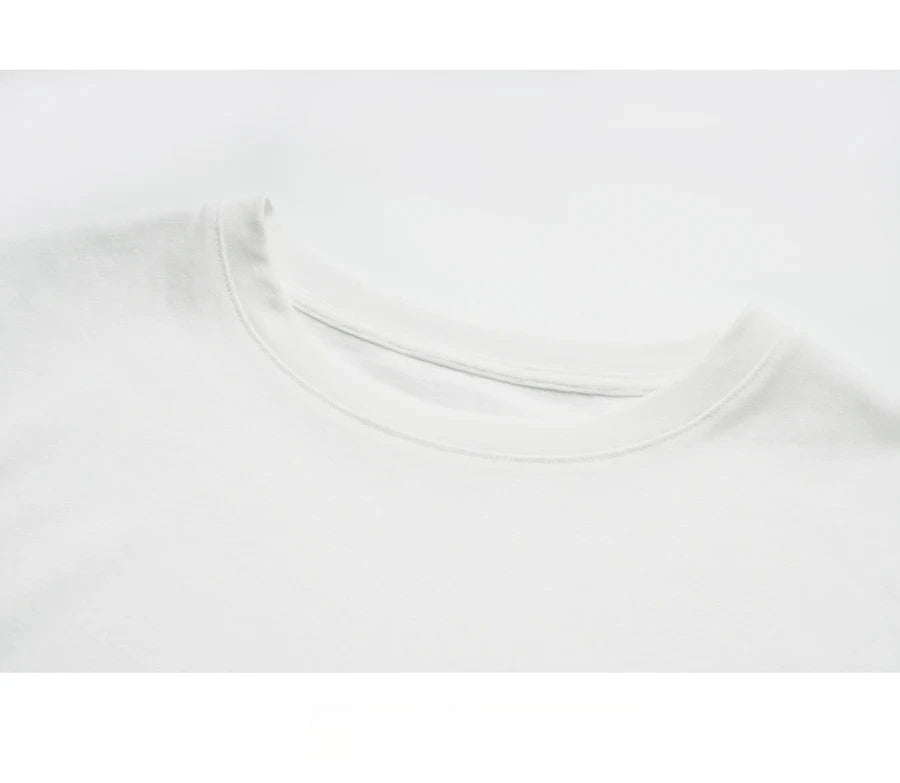 T-shirt femme en coton blanc automne 2026 — décontracté, ample, col rond, manches longues en dentelle