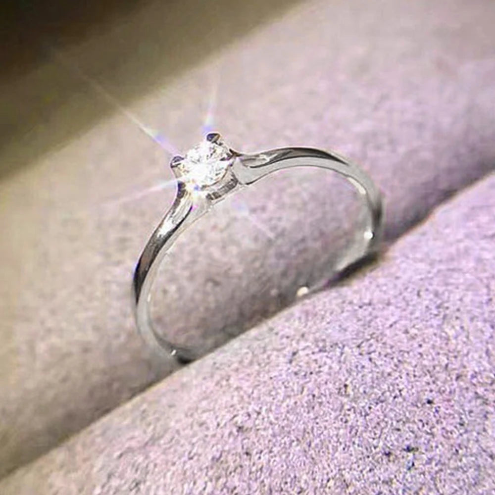 Huitan – Minimalist Wedding Rings for Women, 4MM Cubic Zirconia, Simple and Elegant Finger Accessory, Engagement Jewelry