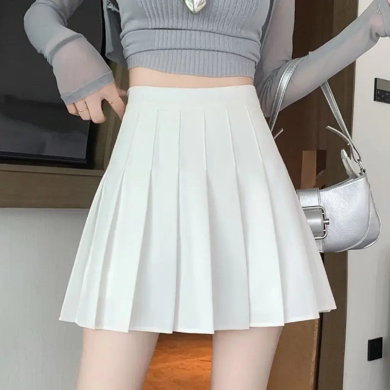 Mini jupe plissée avec short pour femmes, taille haute, ligne a, jupe patineuse, blanc, noir, rose, uniforme scolaire sportif, nouvelle mode, offre spéciale