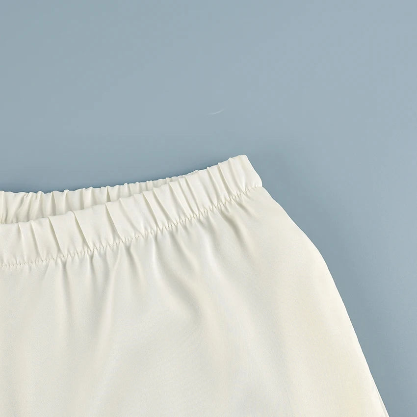 Pantalon ample en crêpe rose pour femme — rue chic, plissé, vintage, taille haute, 2025