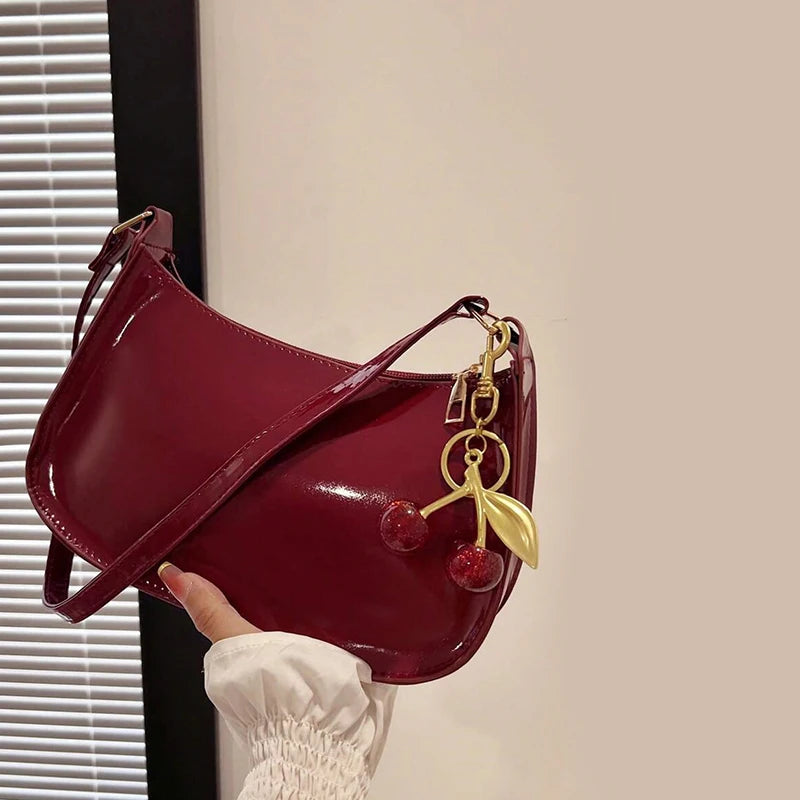 Bolso de cuero PU para mujer, versátil, a la moda, color sólido, colgante de cereza, bolso de hombro informal, bolso de mano, bolso de axila para niñas