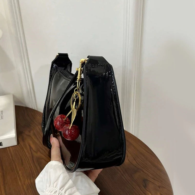 Bolso de cuero PU para mujer, versátil, a la moda, color sólido, colgante de cereza, bolso de hombro informal, bolso de mano, bolso de axila para niñas