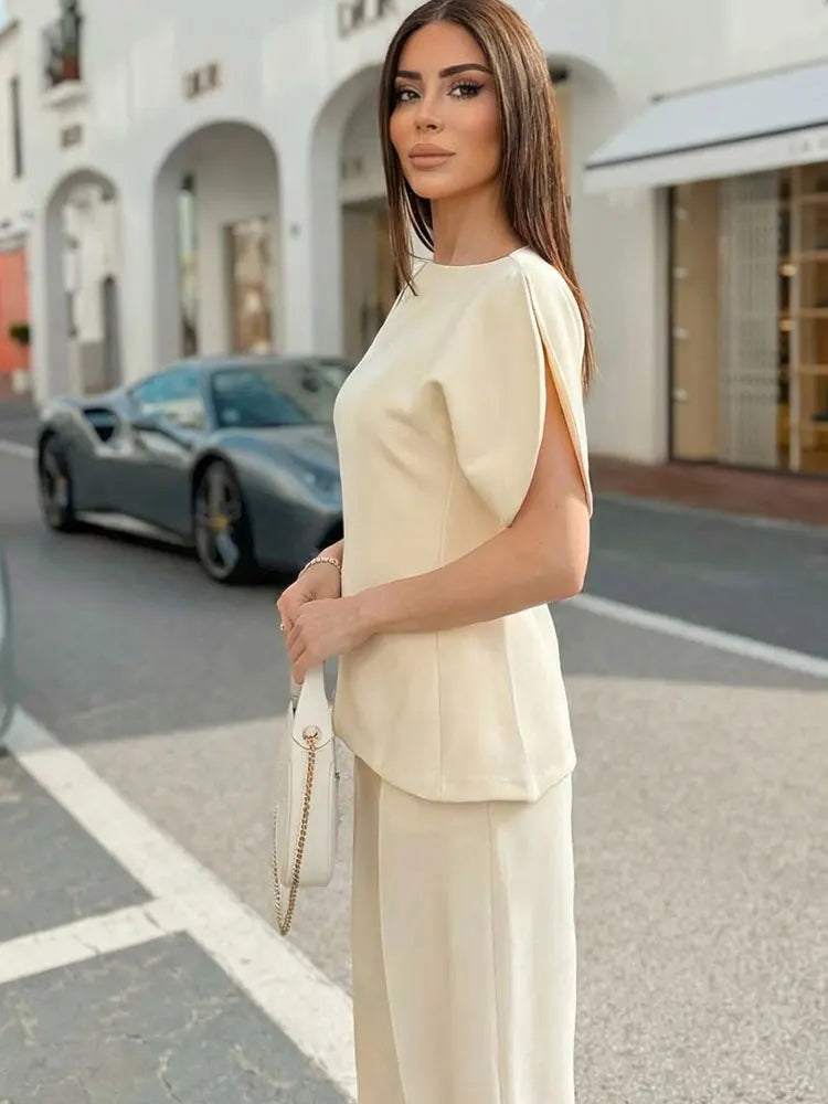Blouse élégante à manches bouffantes et ourlet asymétrique pour femme — streetwear Y2K, printemps 2026