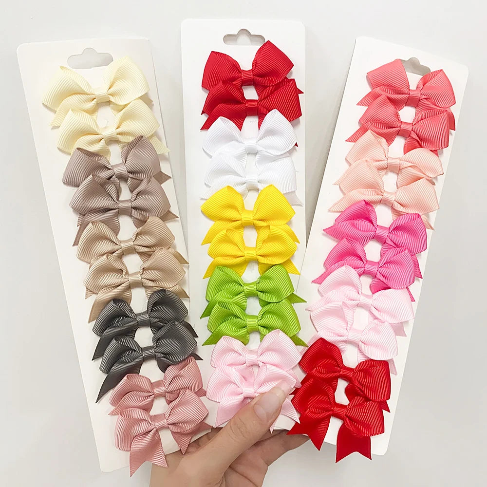 Pinces à cheveux avec nœuds pour enfants, couleur unie, pour bébés filles, ruban fait à la main, épingle à cheveux, Barrettes, accessoires pour cheveux du nouvel an, 10 pièces/ensemble